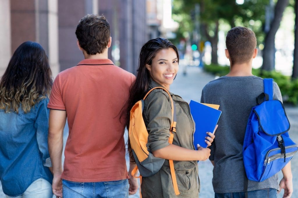 Group of students in internship programs in city during summer.
